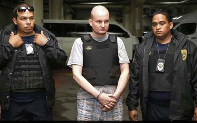 Frederic Laurent Bouquet, al centro custodiado por agentes venezolanos.