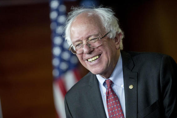Senator Bernie Sanders, an Independent from Vermont, smiles while responding to a question during a news conference on Capitol Hill in Washington, D.C., U.S., on Wednesday, April 29, 2015. Sanders is preparing to enter the race for the Democratic presidential nomination on April 30, according to a person familiar with Sanders' plans. Photographer: Andrew Harrer/Bloomberg via Getty Images