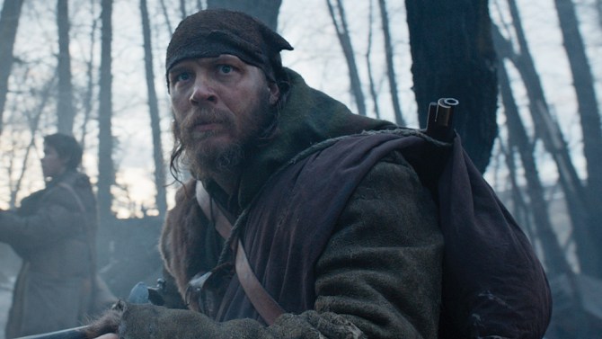 re_select_4.00002444 Tom Hardy (foreground) and Will Poulter hunt for the person they had left for dead, in THE REVENANT. Photo Credit: Courtesy Twentieth Century Fox. Copyright © 2015 Twentieth Century Fox Film Corporation. All rights reserved. THE REVENANT Motion Picture Copyright © 2015 Regency Entertainment (USA), Inc. and Monarchy Enterprises S.a.r.l. All rights reserved. Not for sale or duplication.