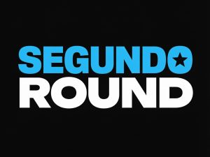 Texto en pantalla negra que lee 'SEGUNDO ROUND' en letras azules y blancas